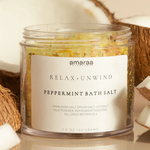 Load image into Gallery viewer, Jar of amaraa Relax + Unwind peppermint bath salt with coconut pieces on beige background