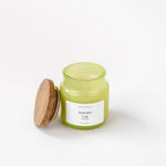 Load image into Gallery viewer, Green Jasmine Noir scented candle jar with wooden lid on white background