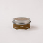 Coffee soy wax candle in a brown metal tin, handpoured, on a white background