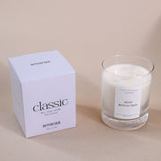 Amaraa classic soy wax candle Deep Reflection with white box on beige background