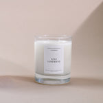 Load image into Gallery viewer, Handpoured Amaraa Fragrances Stay Confident soy wax candle in glass jar on beige background