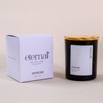 Load image into Gallery viewer, Eternal soy wax candle in black jar with wood lid and branded box by Amaraa Fragrances