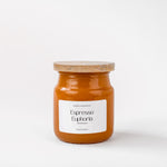 Load image into Gallery viewer, Espresso Euphoria amber glass candle jar with wooden lid on white background