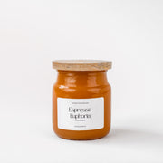 Espresso Euphoria amber glass candle jar with wooden lid on white background