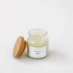 Load image into Gallery viewer, Blossom Bliss scented candle in glass jar with wooden lid on white background