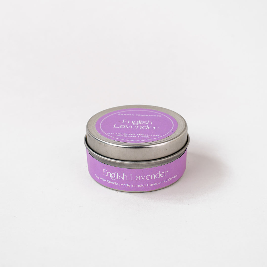 English Lavender soy wax candle in a purple tin on a white background