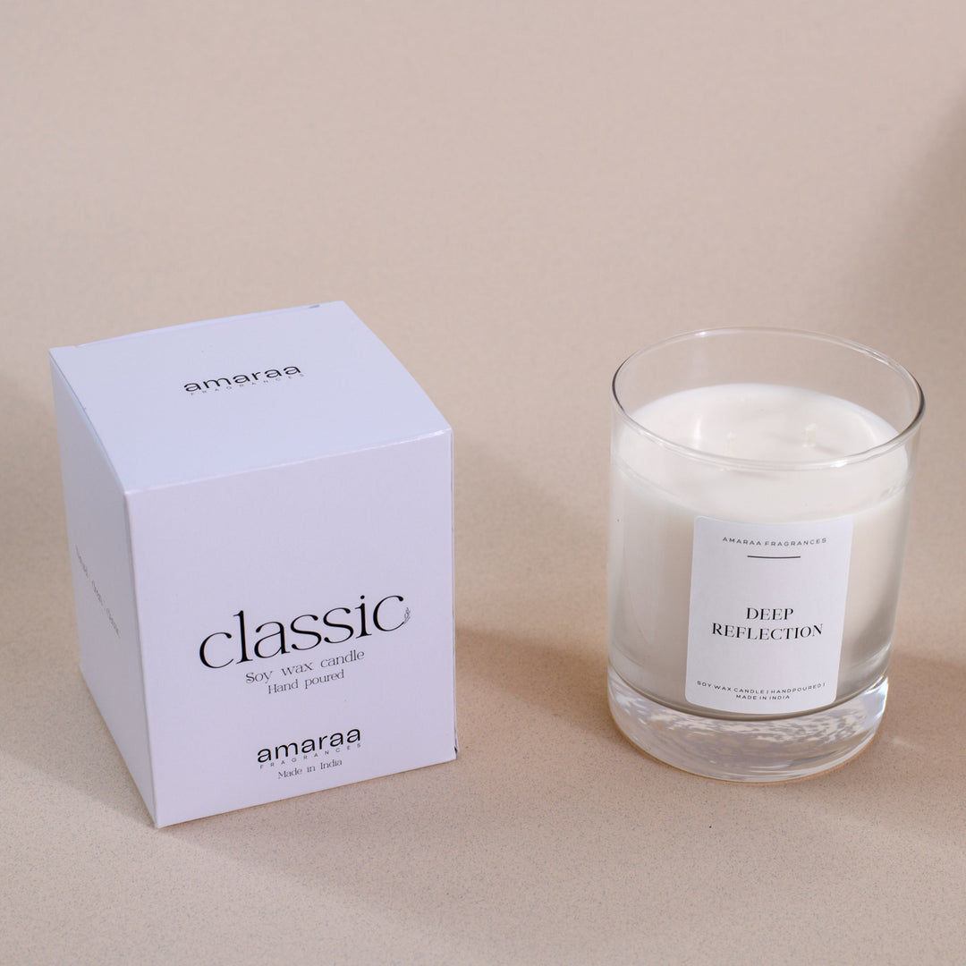 Amaraa classic soy wax candle Deep Reflection with white box on beige background