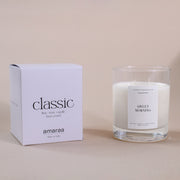 Amaraa classic soy wax candle Sweet Morning scent in glass jar with packaging on beige background