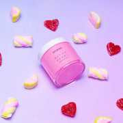 Pink Ameraa Blush Berry whipped soap jar with heart gummies and marshmallows on purple background