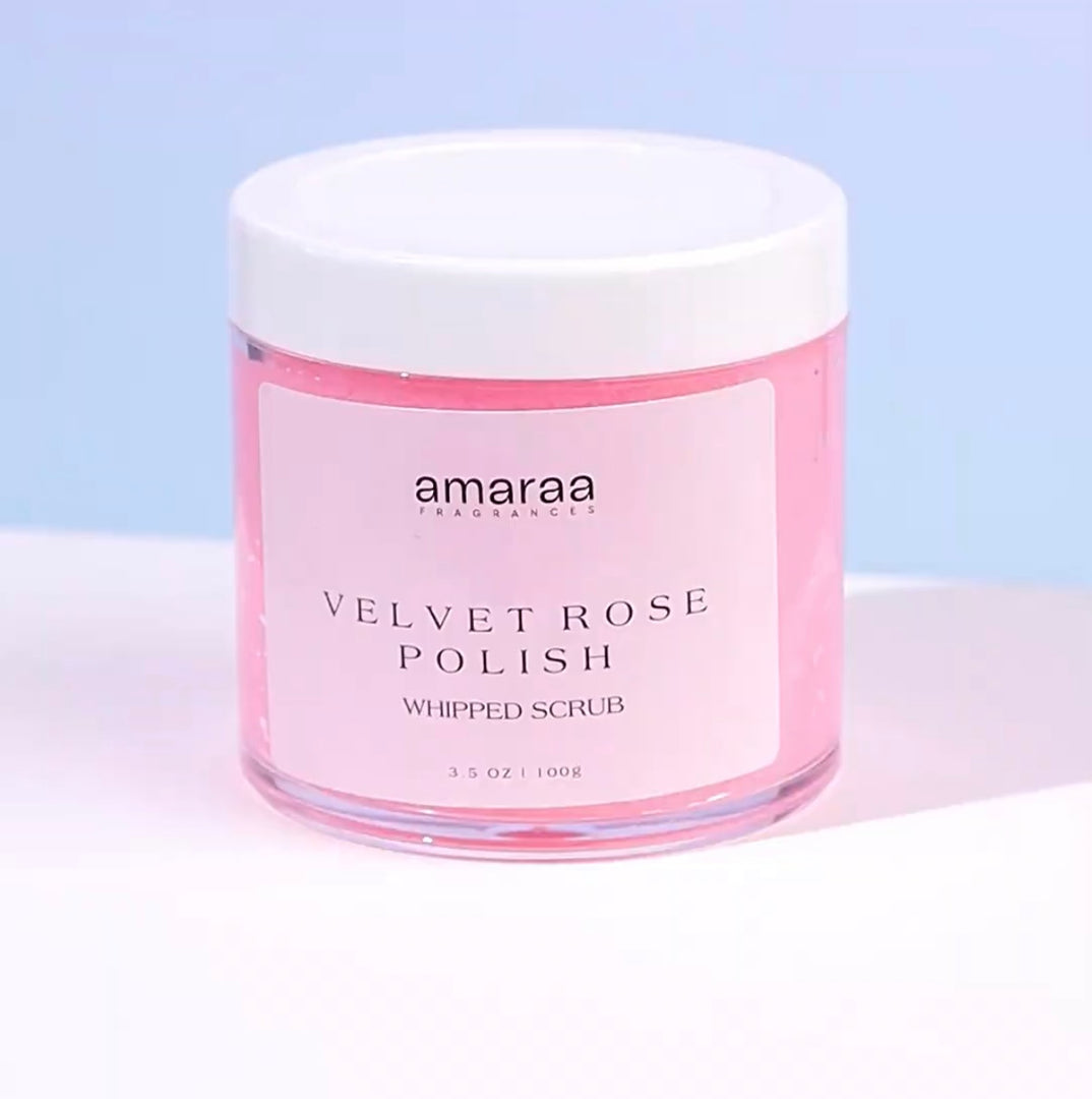 Amaraa Velvet Rose Polish whipped scrub in pink jar on a light blue background