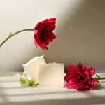 Load image into Gallery viewer, Handmade natural soap bars with pink flowers on a neutral background