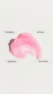 Pink lip scrub swatch on white background with text: exfoliates, softens, hydrates, smoothes